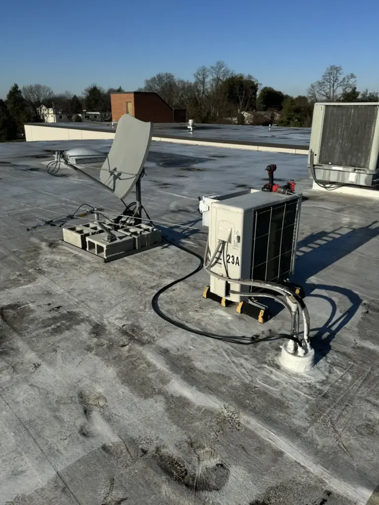 Ballasted rooftop satellite dish at Encompass Health Mechanicsburg